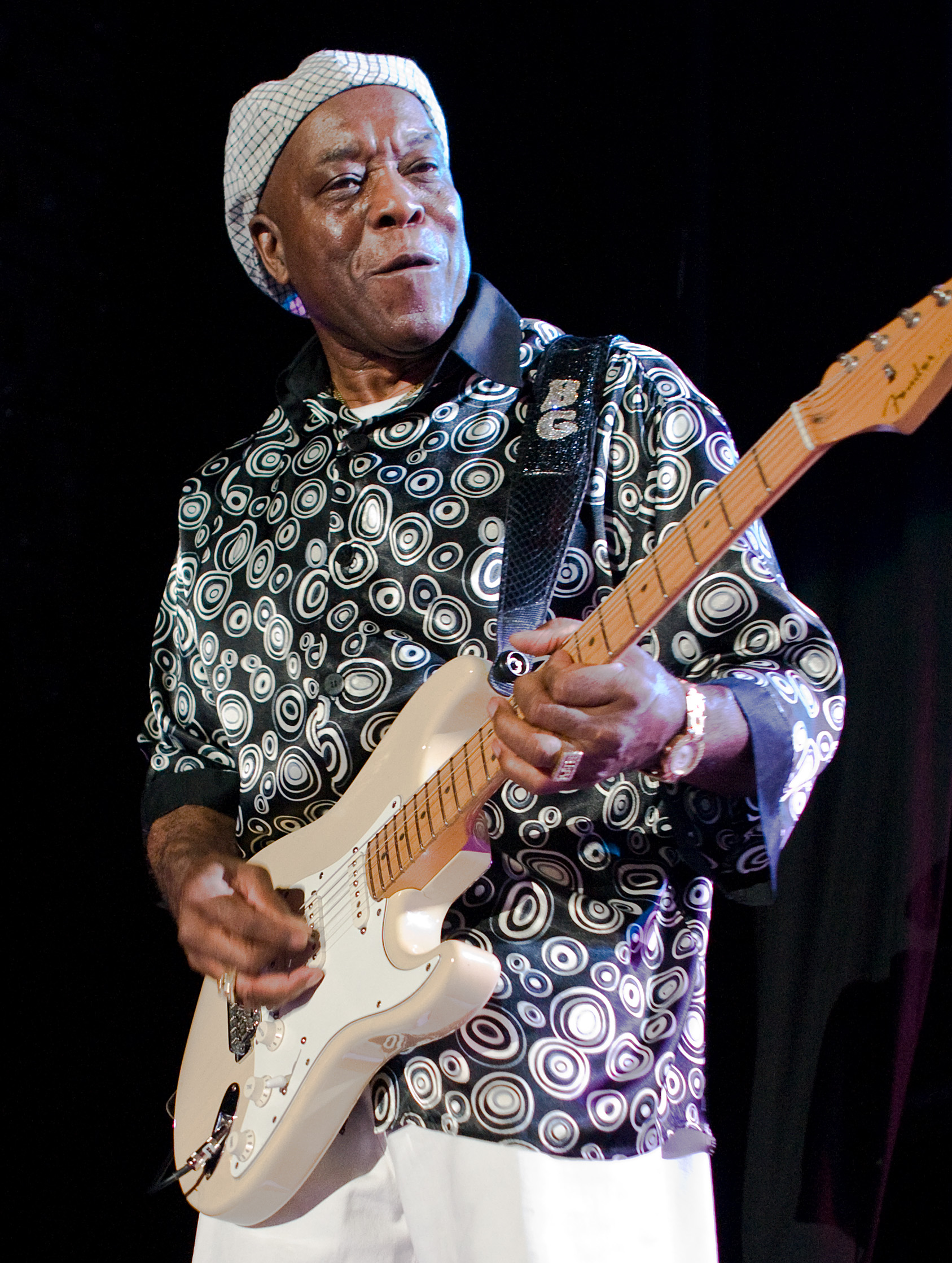 Buddy Guy performing electric blues guitar on stage in 2008