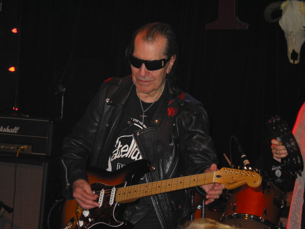 Link Wray playing guitar on stage at the Tractor Tavern in Seattle in July 2005
