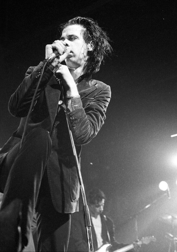 Nick Cave performing on stage in Deinze Belgium in 1986
