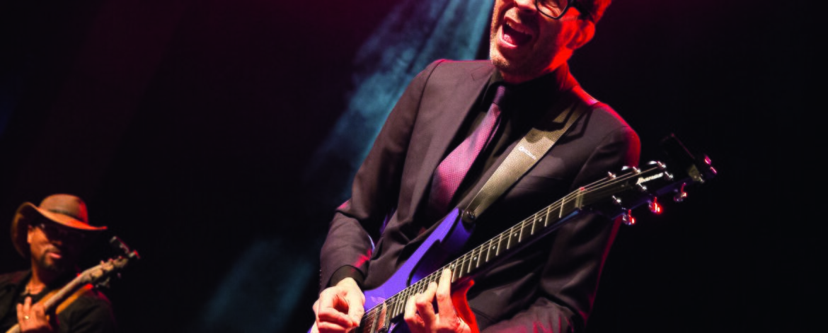 Paul Gilbert performing at Guitar Summit in September 2019
