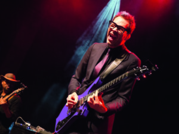 Paul Gilbert performing at Guitar Summit in September 2019