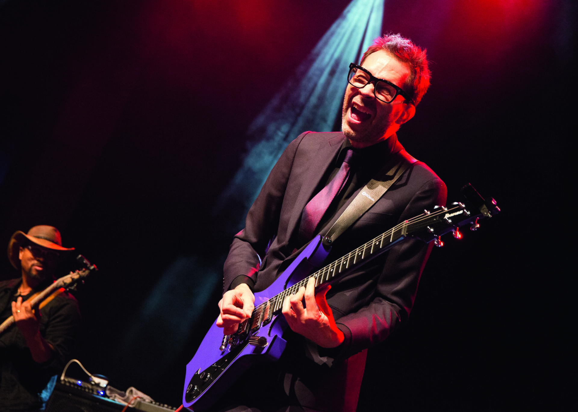 Paul Gilbert performing at Guitar Summit in September 2019
