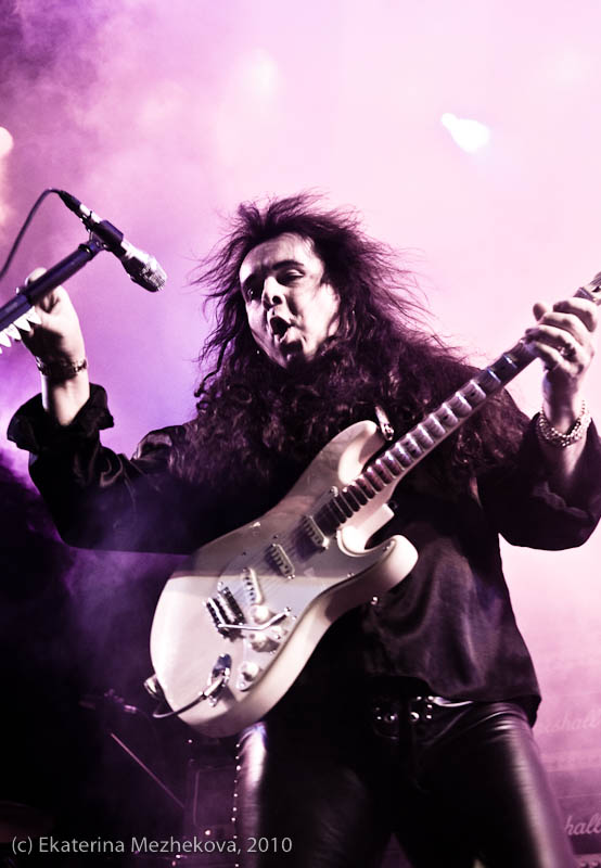 Yngwie Malmsteen playing guitar on stage in Moscow in April 2010