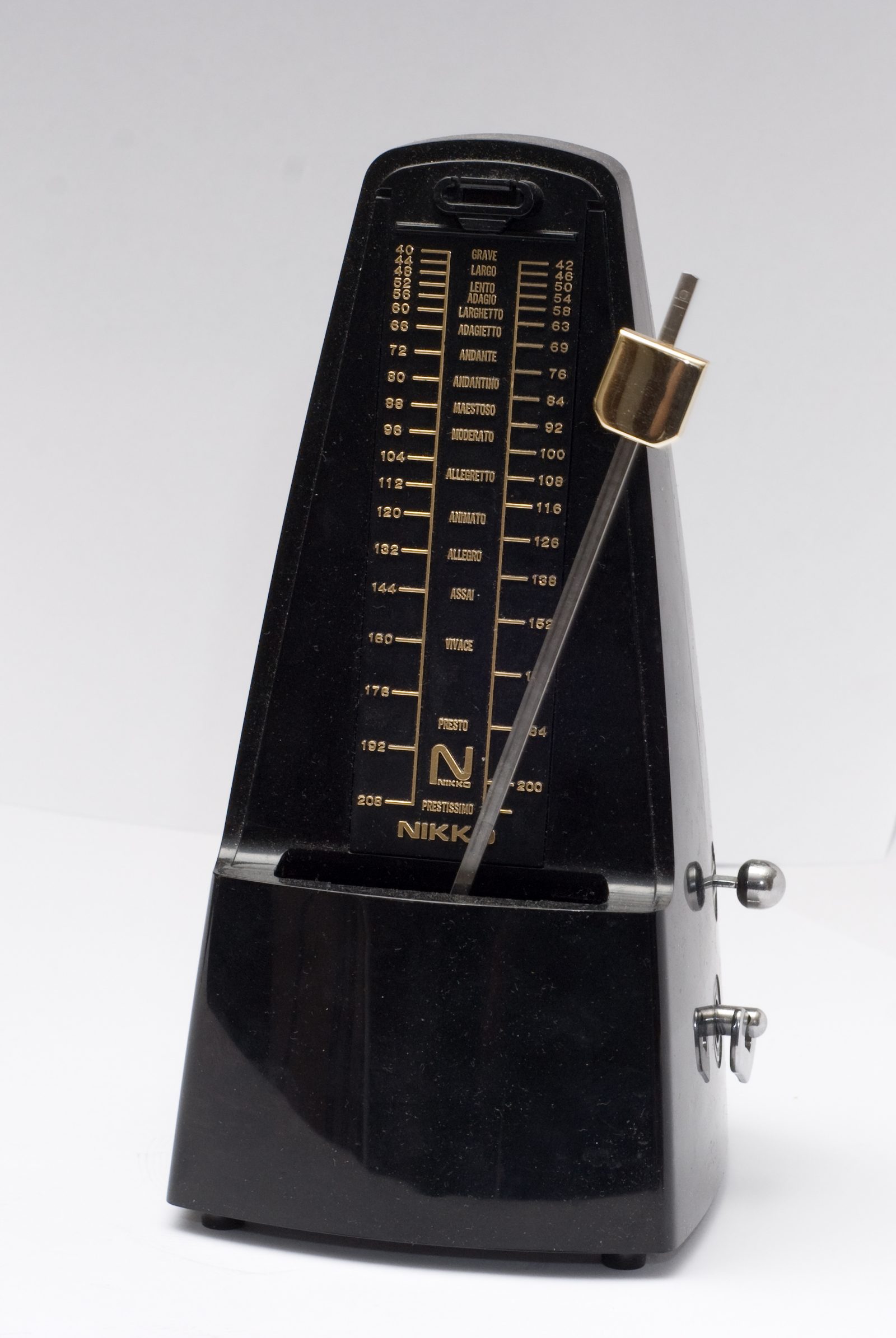 Mechanical Nikko metronome used to build speed slowly and cleanly
