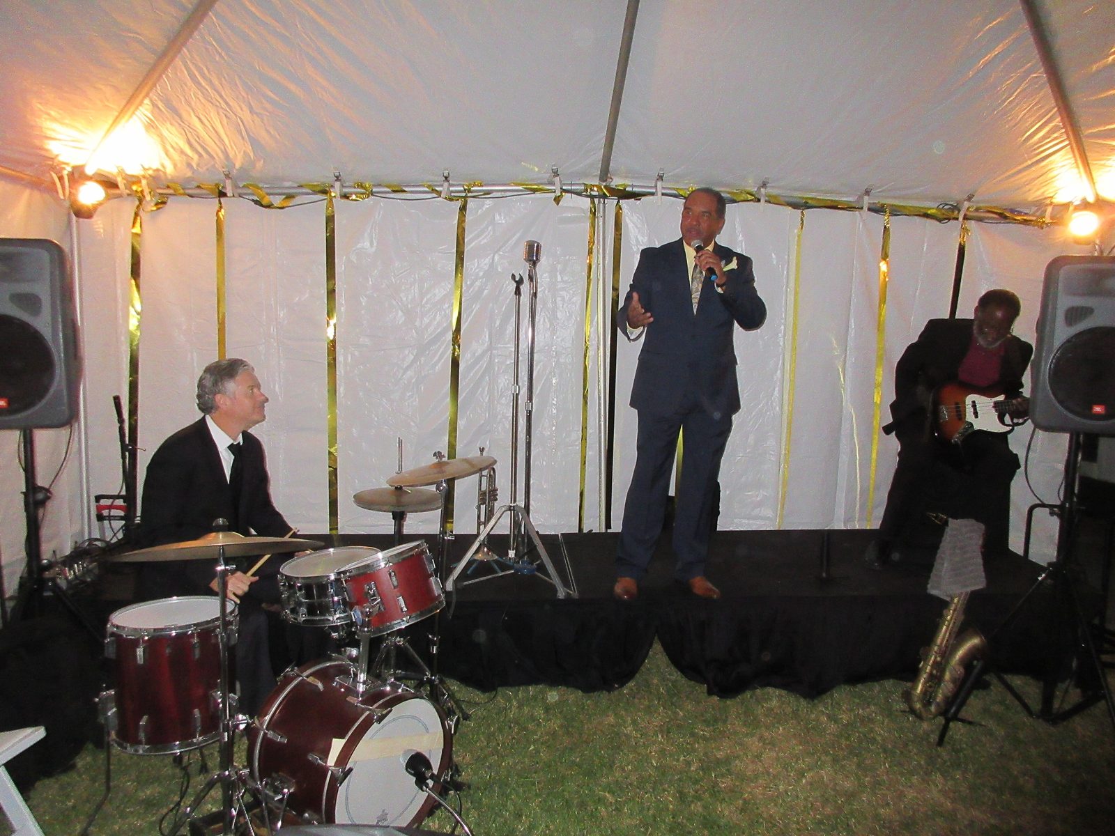 Function band playing in a marquee at a wedding reception